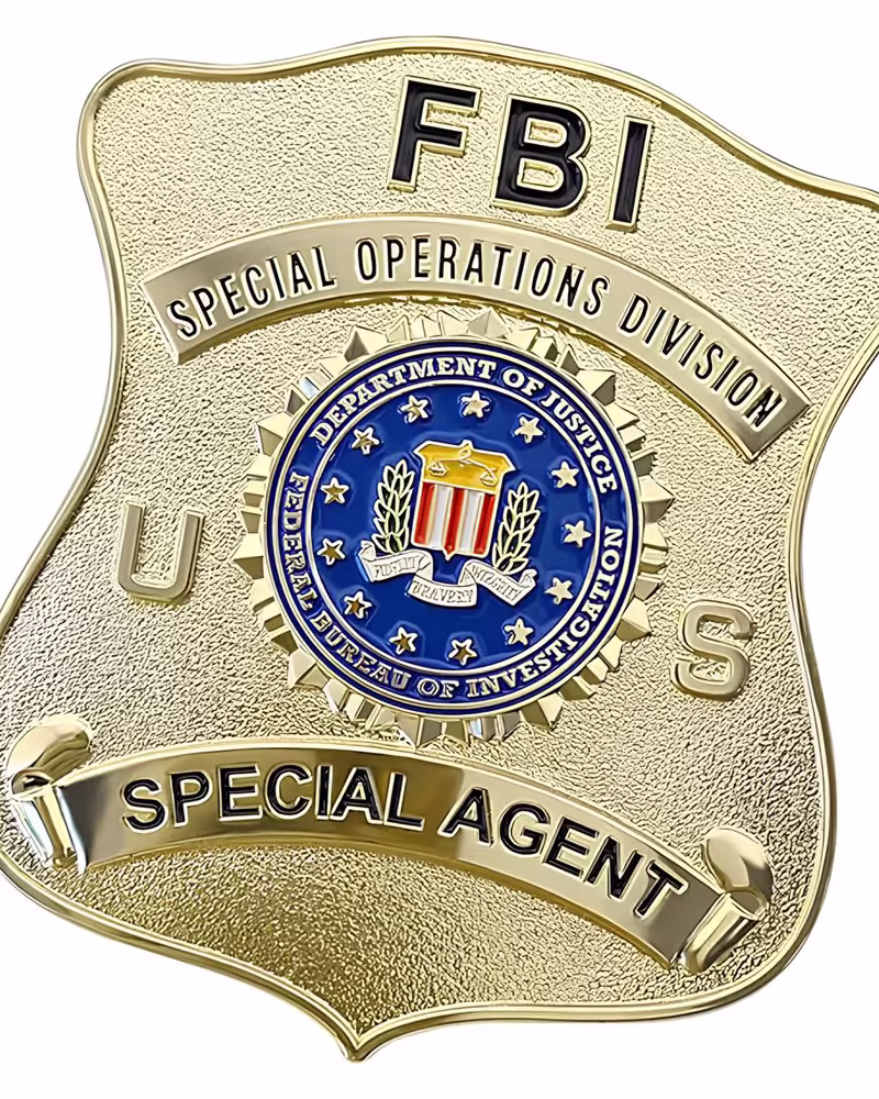 Engraved security officer badge with gold finish and custom text