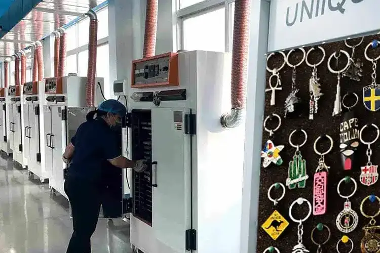 Modern manufacturing facility of UNIQUE, a custom keychain supplier, showcasing quality production.